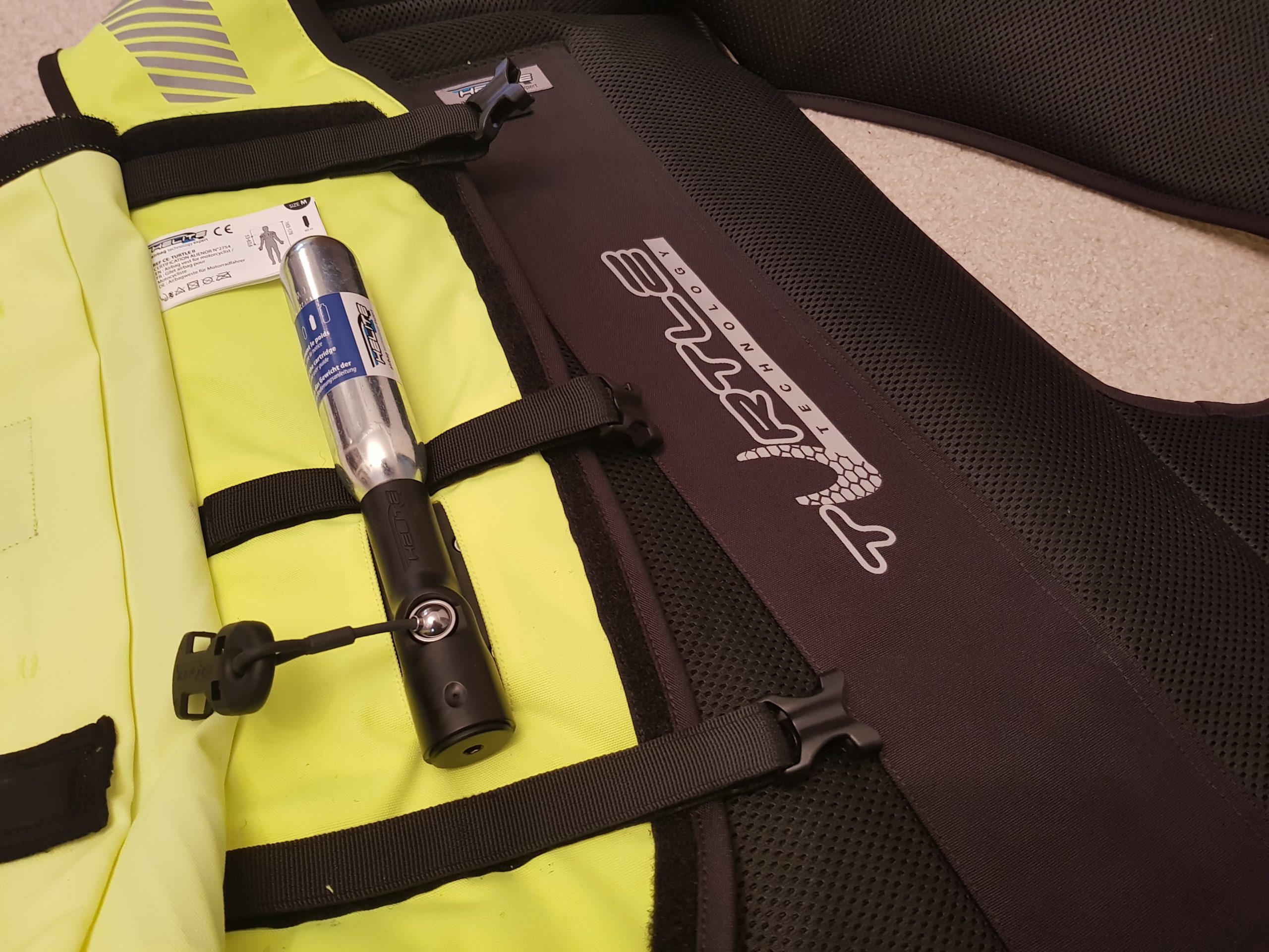 CO2 Canister Attached To The Inflating Mechanism - Helite Turtle 2 Airvest